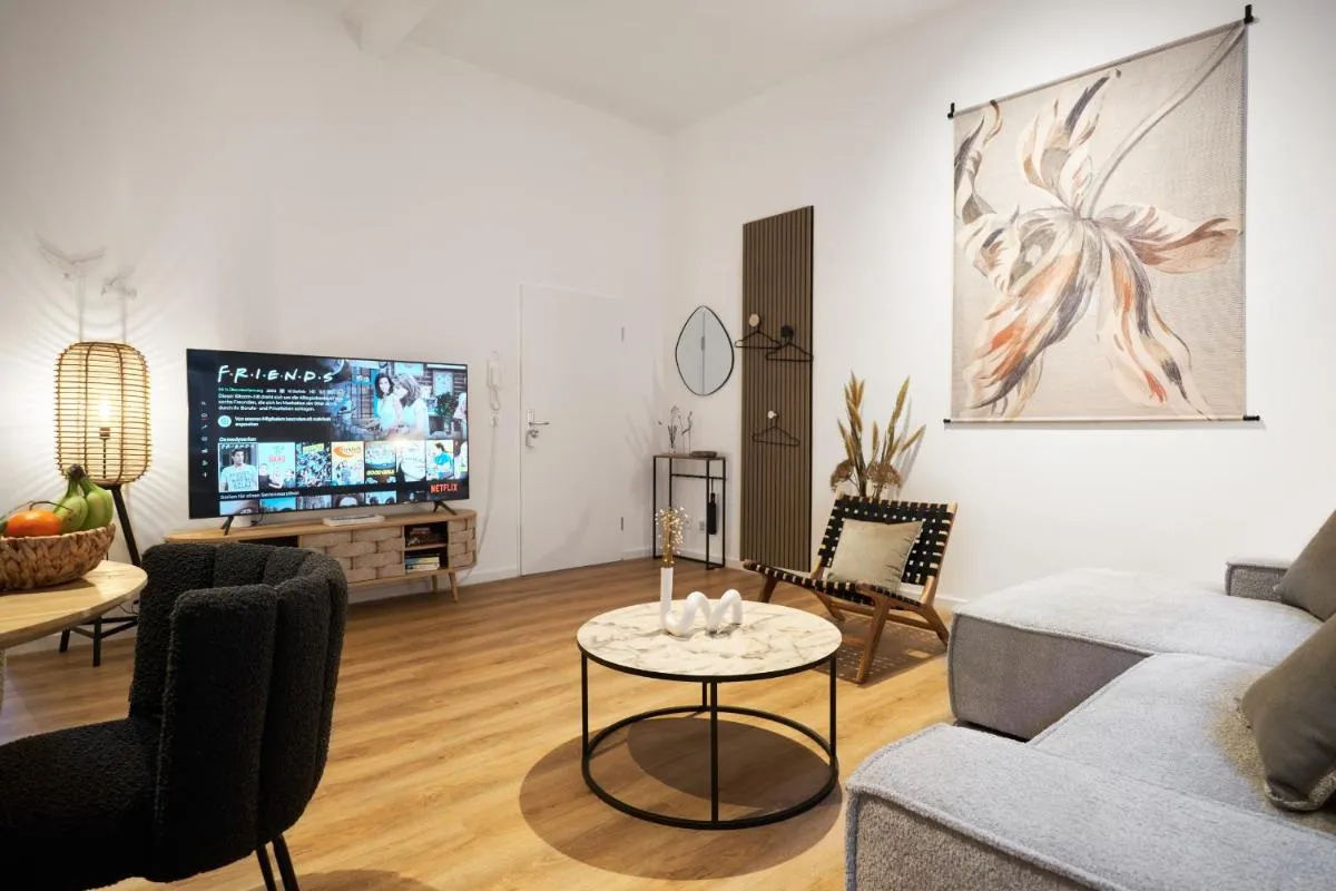 Image 4 of Park Avenue Apartments – Dom mit Stil – Küche – Parkplatz – WLAN – 65 Zoll TV – NETFLIX